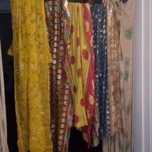 Four heavily embroidered/sequined/patterned shawls